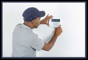 furnace maintenance belmar nj furnace service Belmar NJ furnace maintenance technician performing furnace service on thermostat