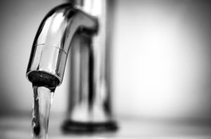 HVAC repair Manasquan isn't all that matters; image is a close up of a running tap